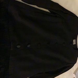 Dress with black fringe at the hips